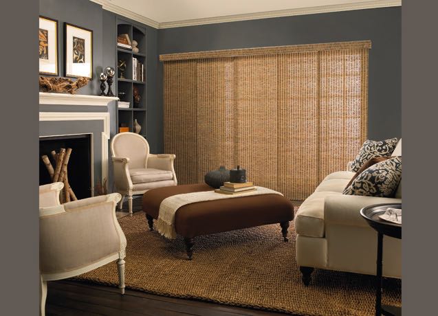 New Brunswick Living room with grey walls and tan sliding panel tracks.